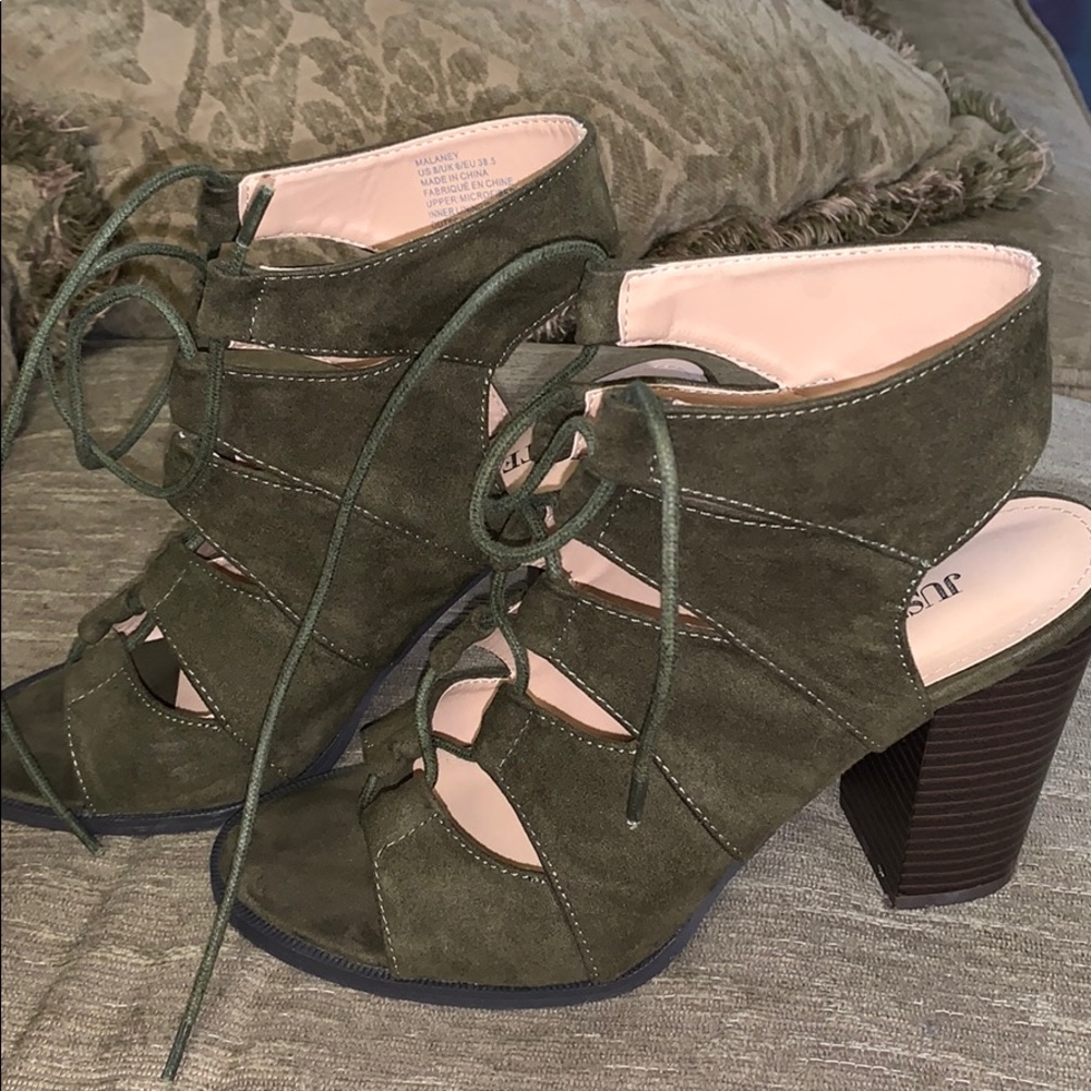 Green lace up woman’s heels